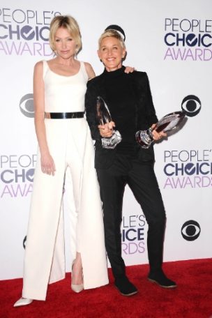 Ellen DeGeneres donned a black suit, while Portia De Rossi wore a Safiyaa white dress with matching trousers and a metallic belt. 