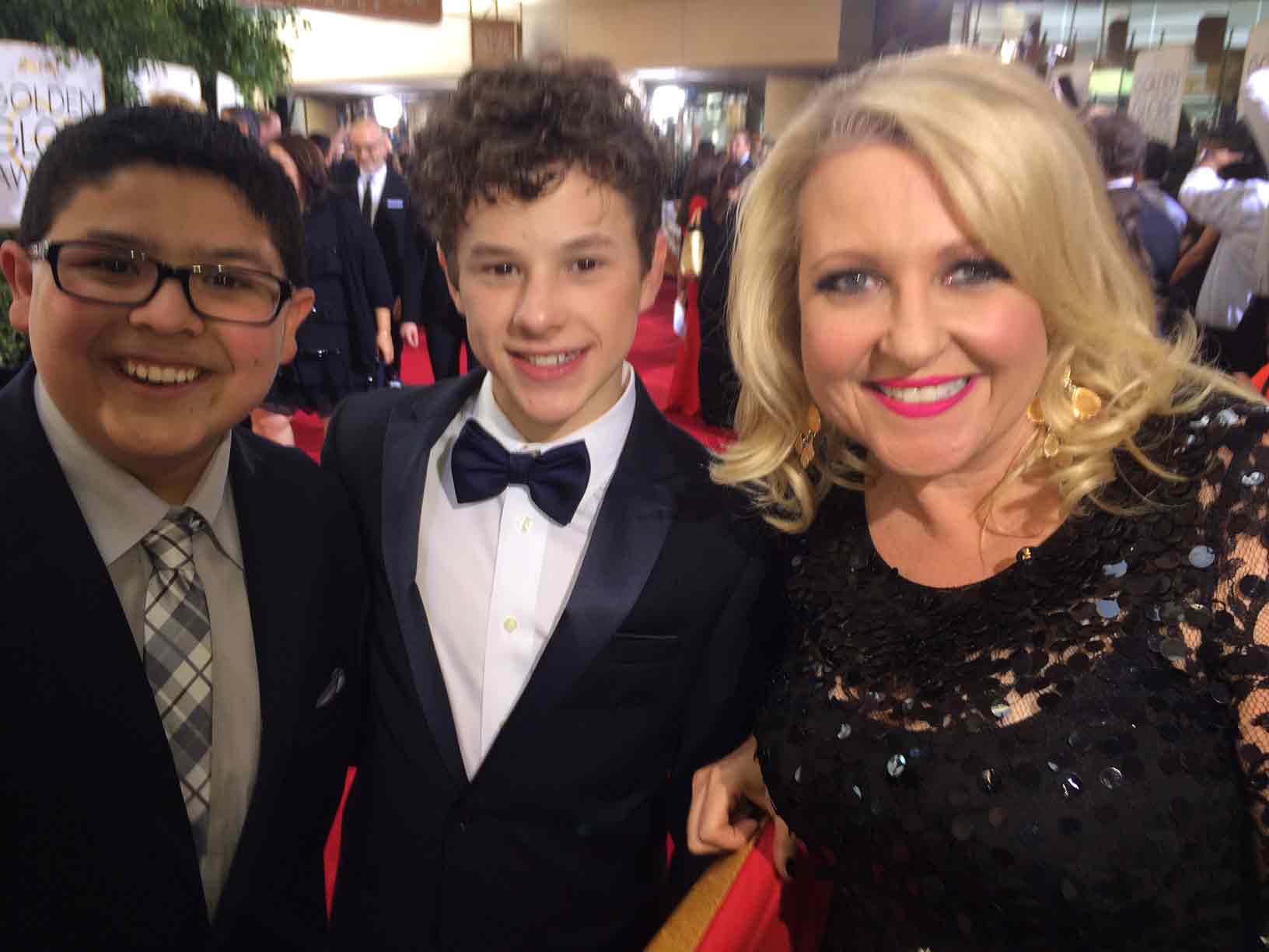 Angela with the boys from Modern Family