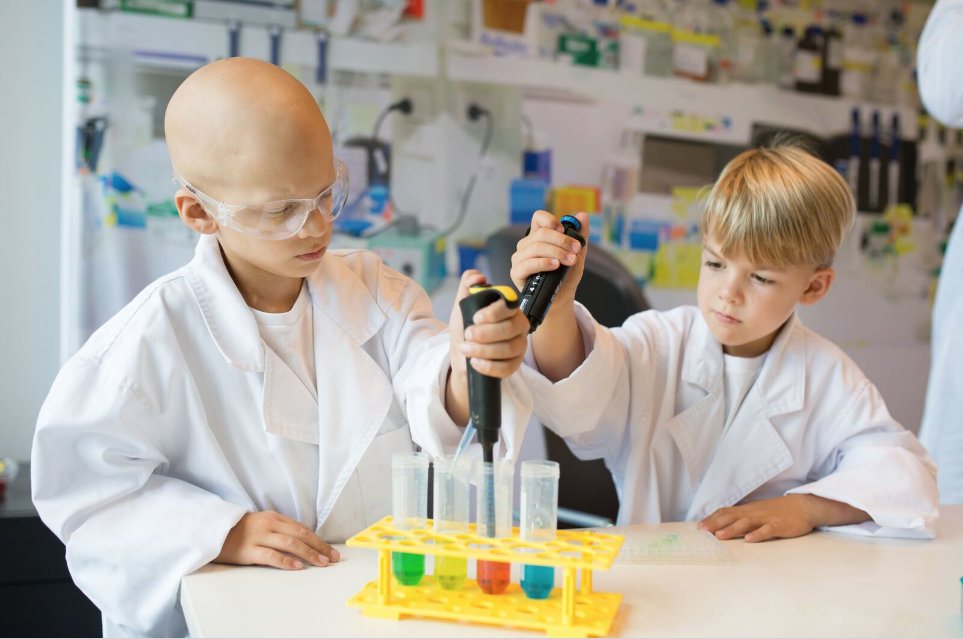 Declan and his brother Brodie in a science lab