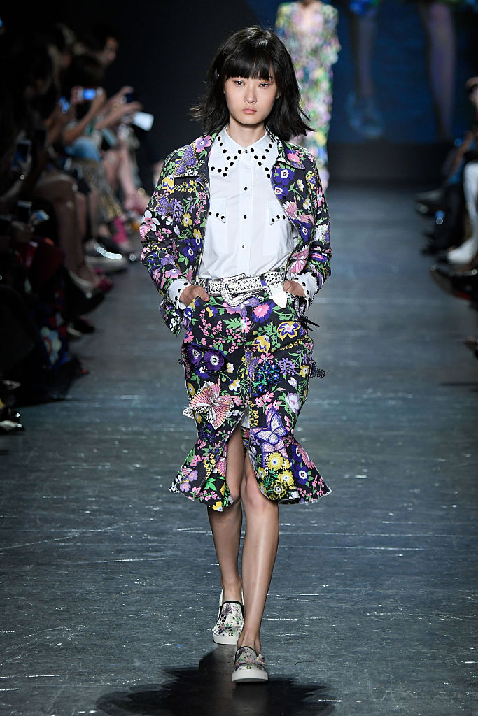 Vivienne Tam showcases some funky florals and bold belts in her runway show