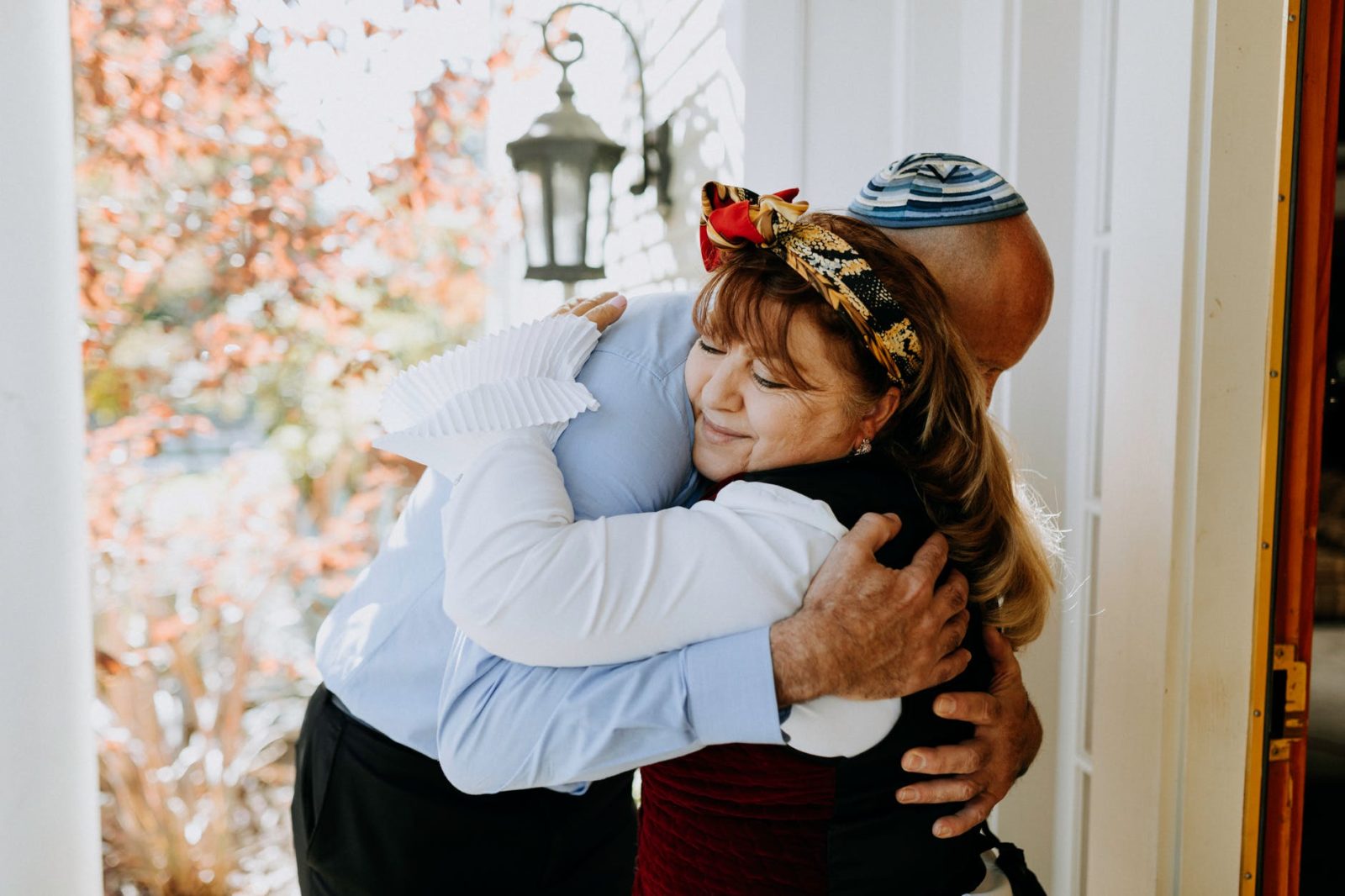 photo of man and woman hugging each other