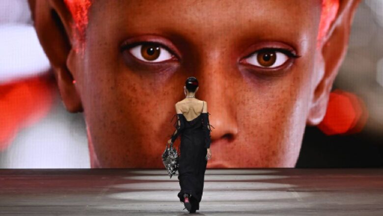 Caption SYDNEY, AUSTRALIA - MAY 17: A model walks the runway during the INJURY show during Australian Fashion Week Presented By Pandora 2024 at Carriageworks on May 17, 2024 in Sydney, Australia. (Photo by Stefan Gosatti/Getty Images for AFW)